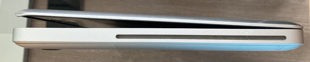 Picture of a 2008 MacBook showing the right side