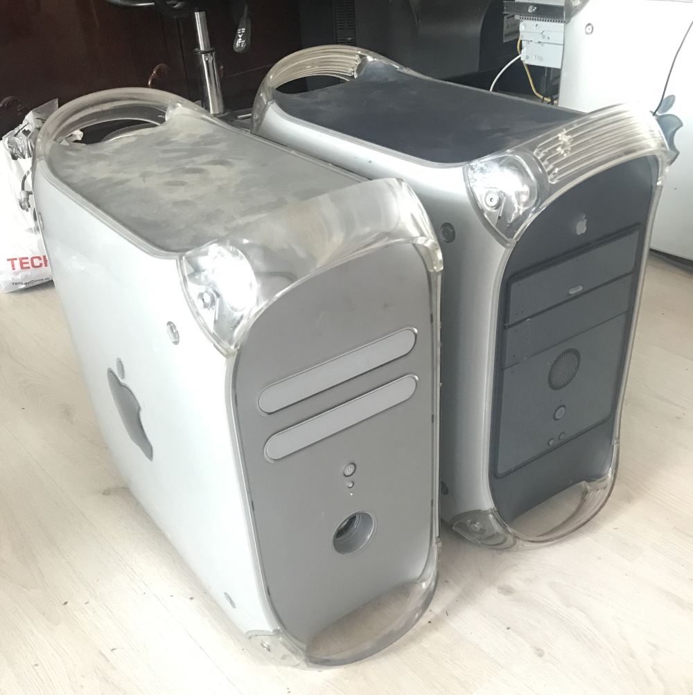 Picture of two Power Mac G4s - left is Quicksilver and the right is a Graphite AGP model